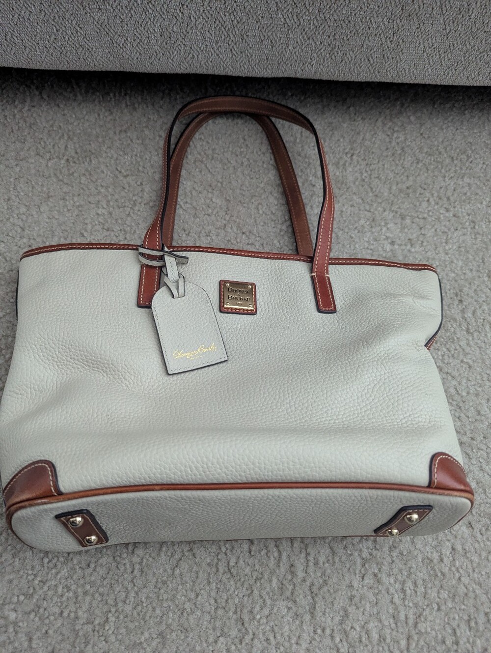 Dooney & Bourke Cream Pebbled Leather Tote with Brown Trim